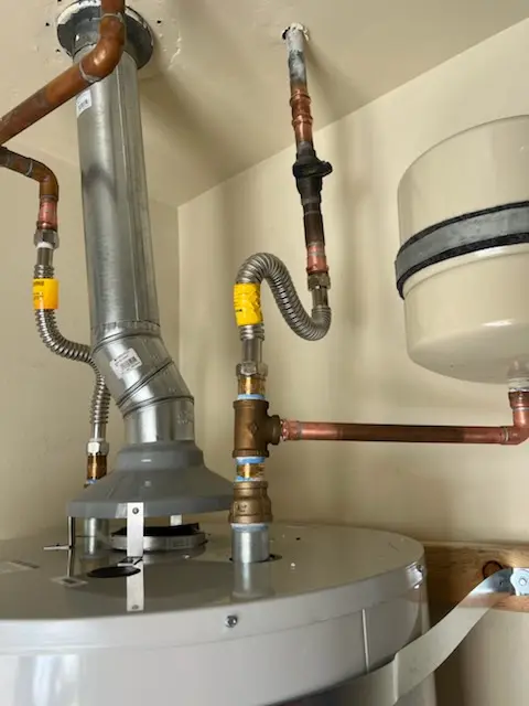 Water heater installation and plumbing repair in Atlas